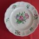 Lot 8 flat plates porcelain of Lunéville Flower patterns