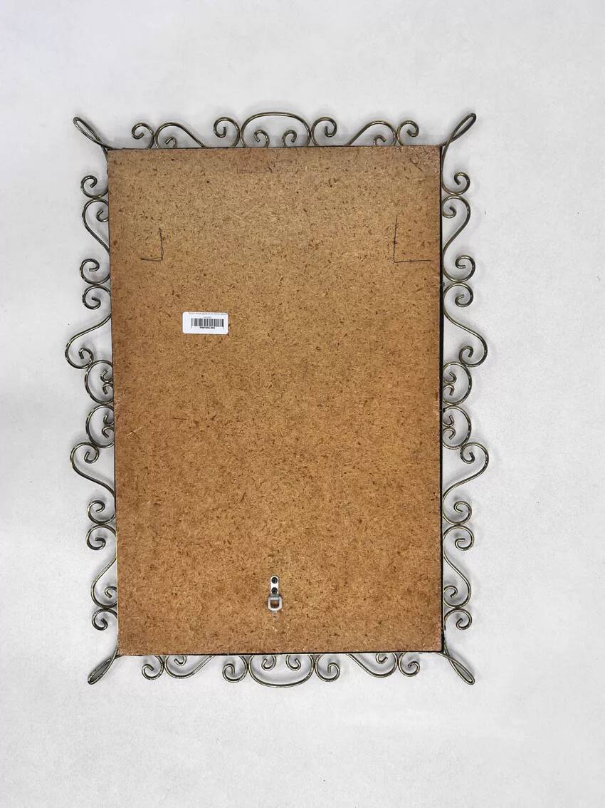 Rectangular mirror from the 50s-60s on a brass frame.