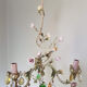Painted metal chandelier and porcelain flowers