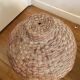 Large vintage lampshade made of hand-woven rattan.