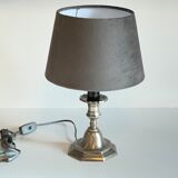 Steel candlestick lamp and grey velvet