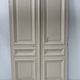 Pair of Haussmann-style double passage doors in patinated oak from the 19th century.