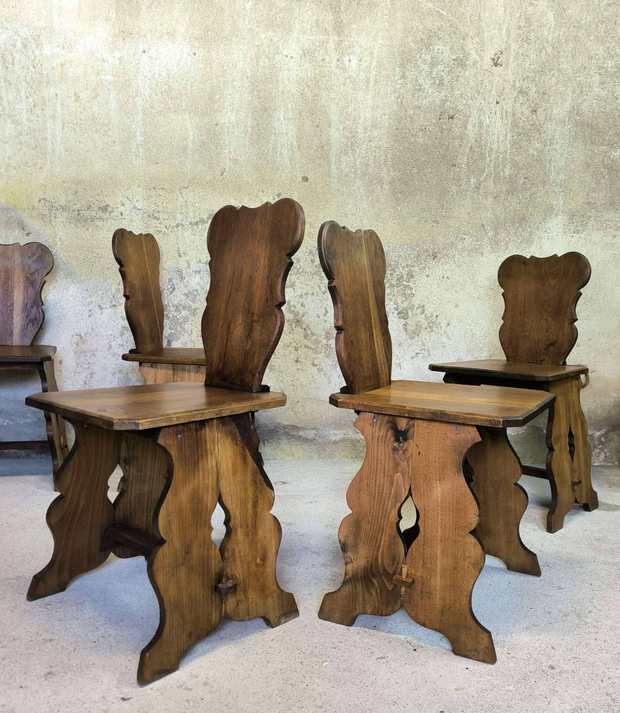 Set of six vintage brutalist wooden chairs.