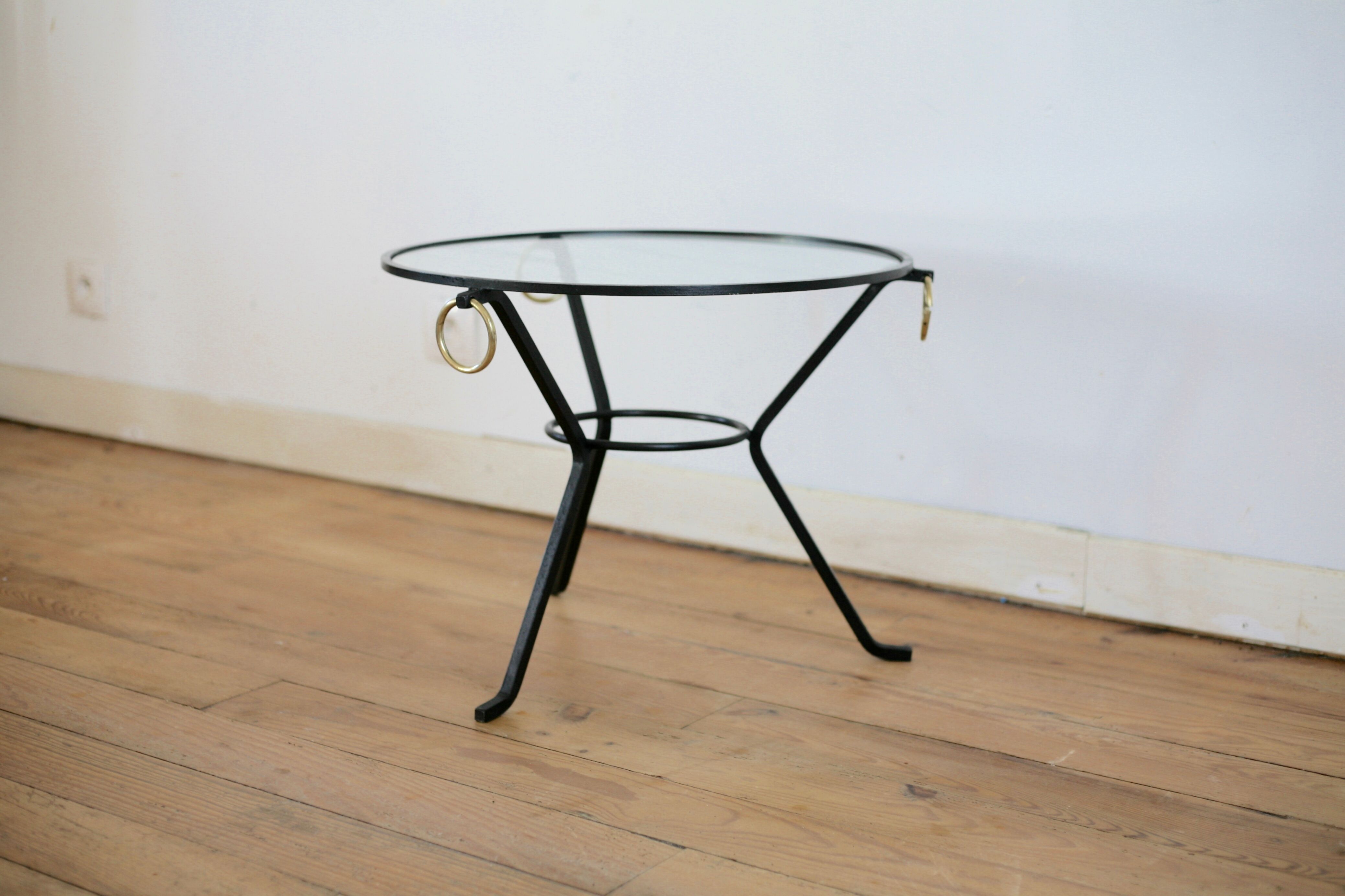 Coffee table black lacquered metal, glass and brass, France, circa 1950.