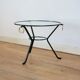 Coffee table black lacquered metal, glass and brass, France, circa 1950.