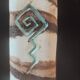 Turned stoneware vase signed with relief decoration.