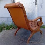 Chesterfield armchair in wood and leather