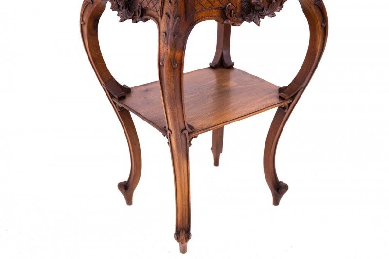 Small table with delicate carving, France, circa 1890.