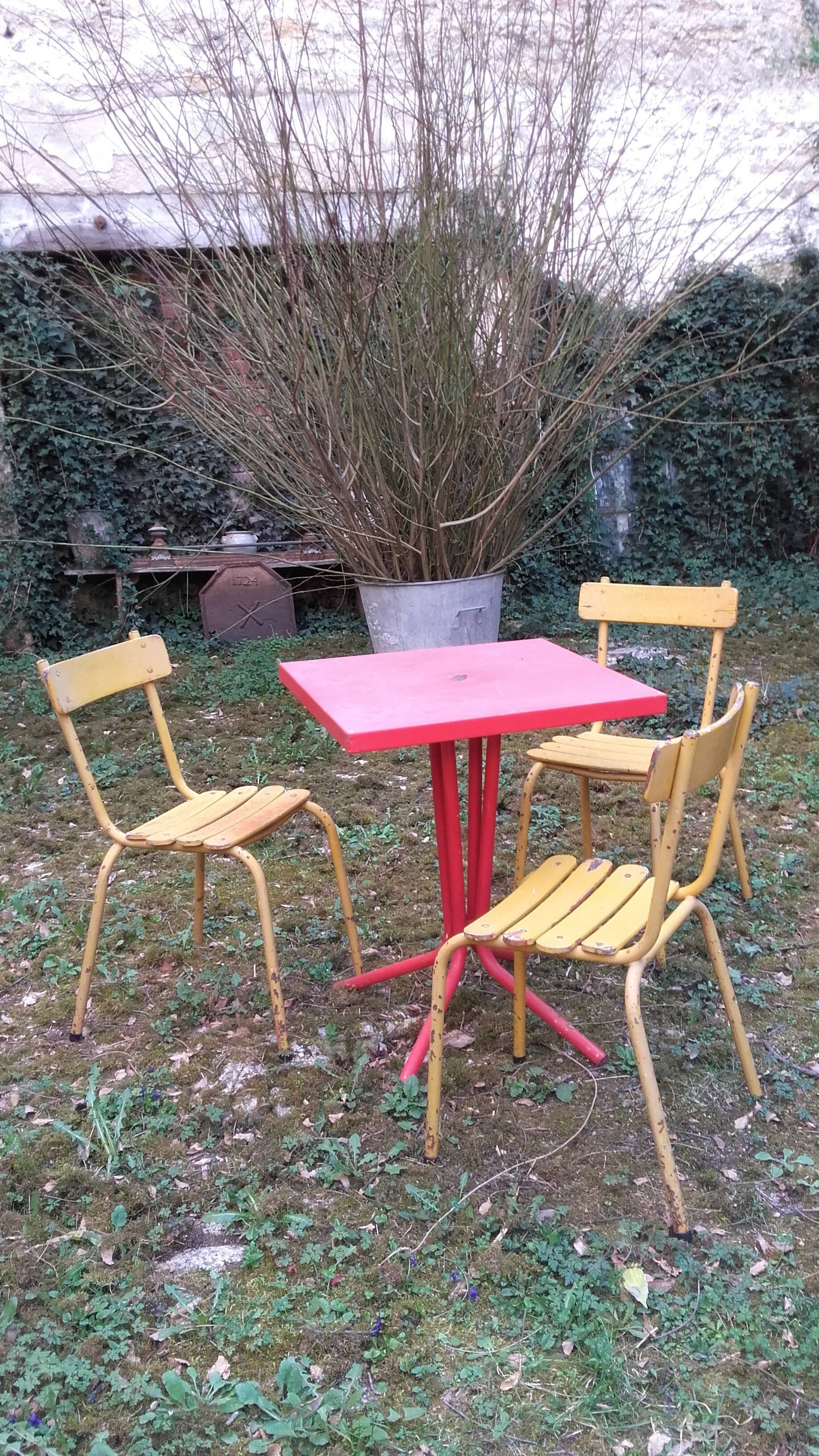 Three wooden and metal bistro chairs