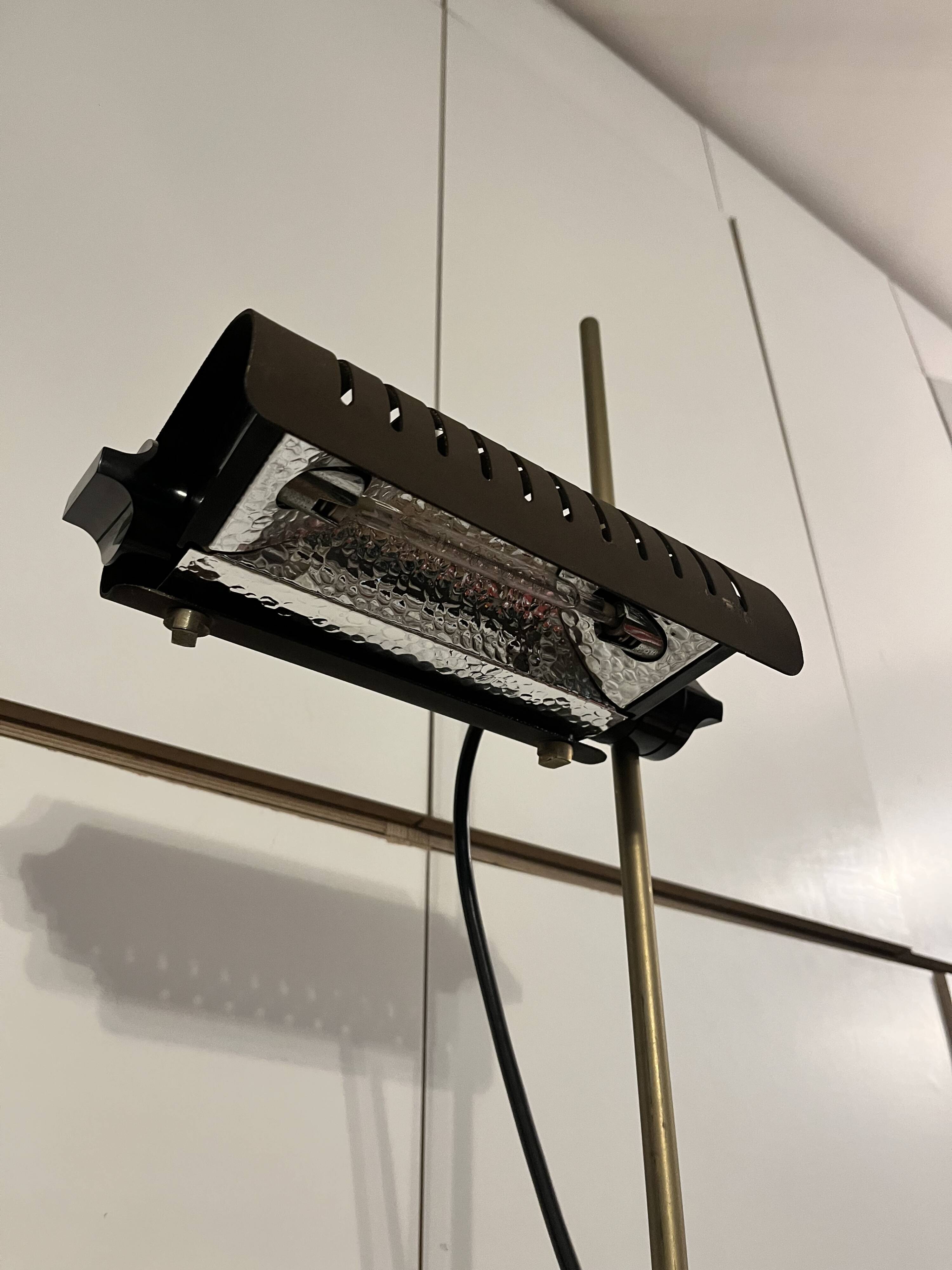 626/L brown floor lamp designed by Joe Colombo, vintage Oluce edition from the 1960s.