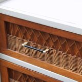 Scandinavian chest of drawers made of wood and rattan