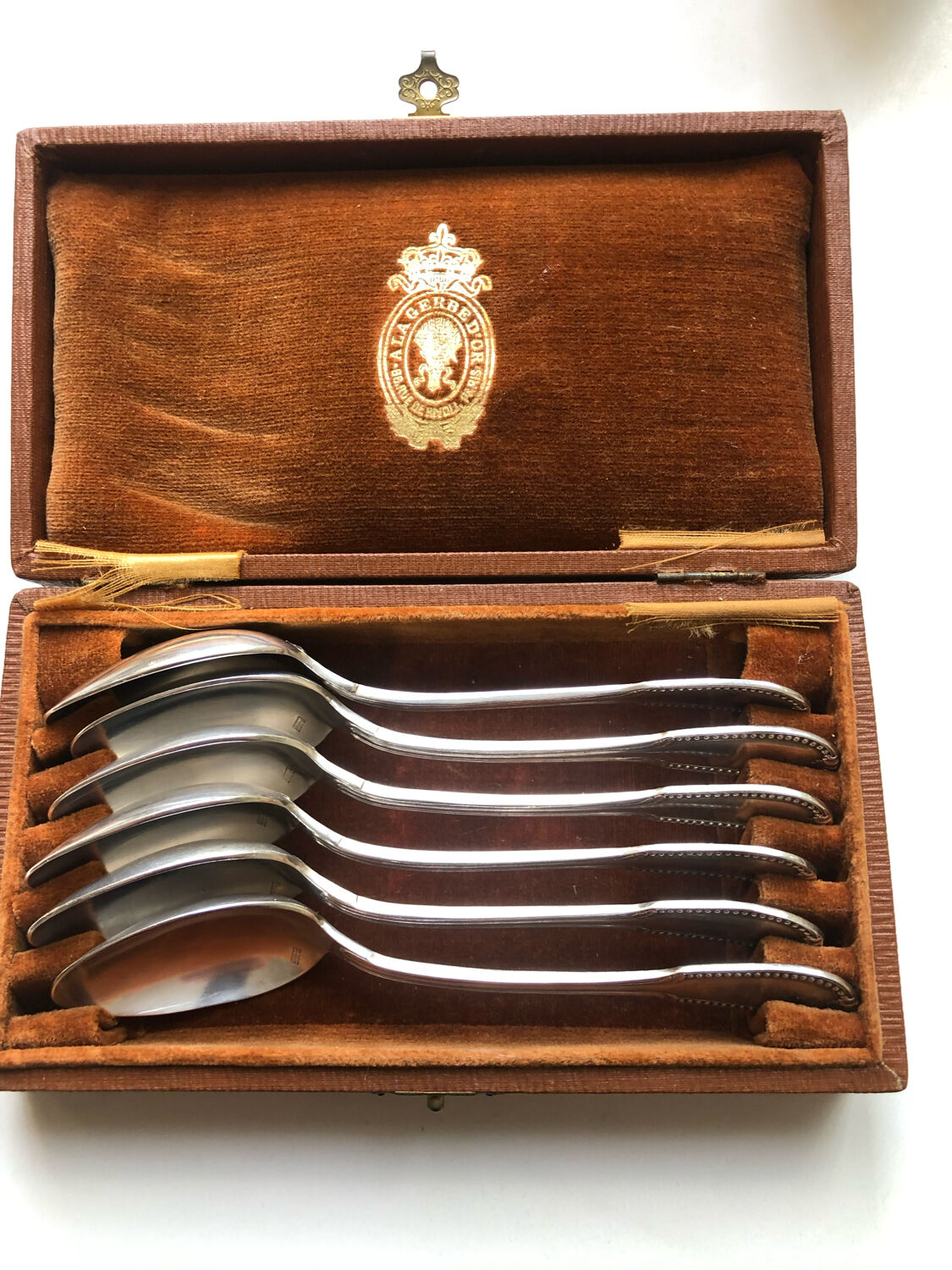 6 small silver metal spoons