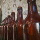 Set of 10 bottles of old Bordeaux French wine in ruby brown glass, 19th century.