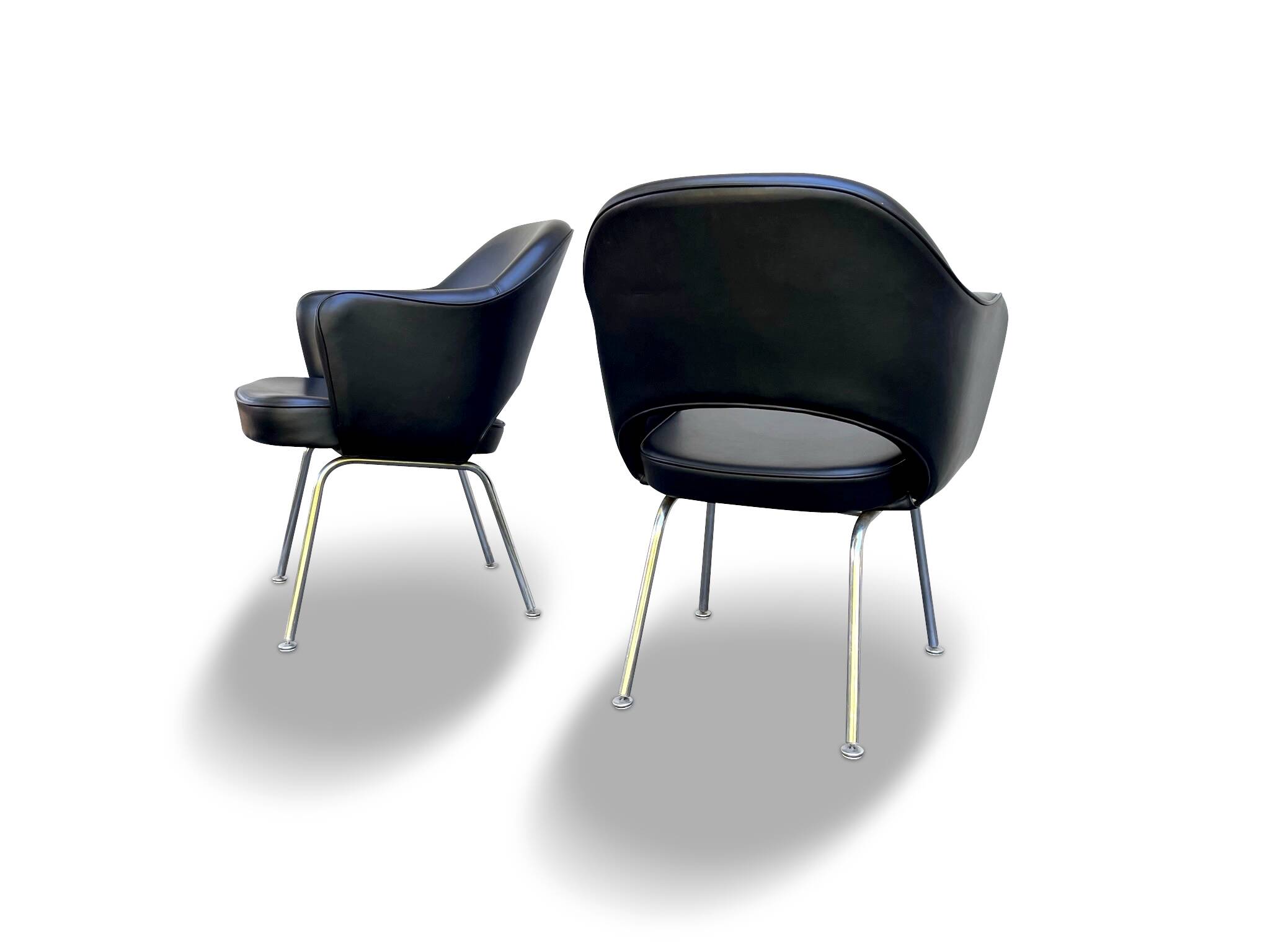 Pair of "Conference" armchairs by Eero Saarinen for Knoll International, black and chrome