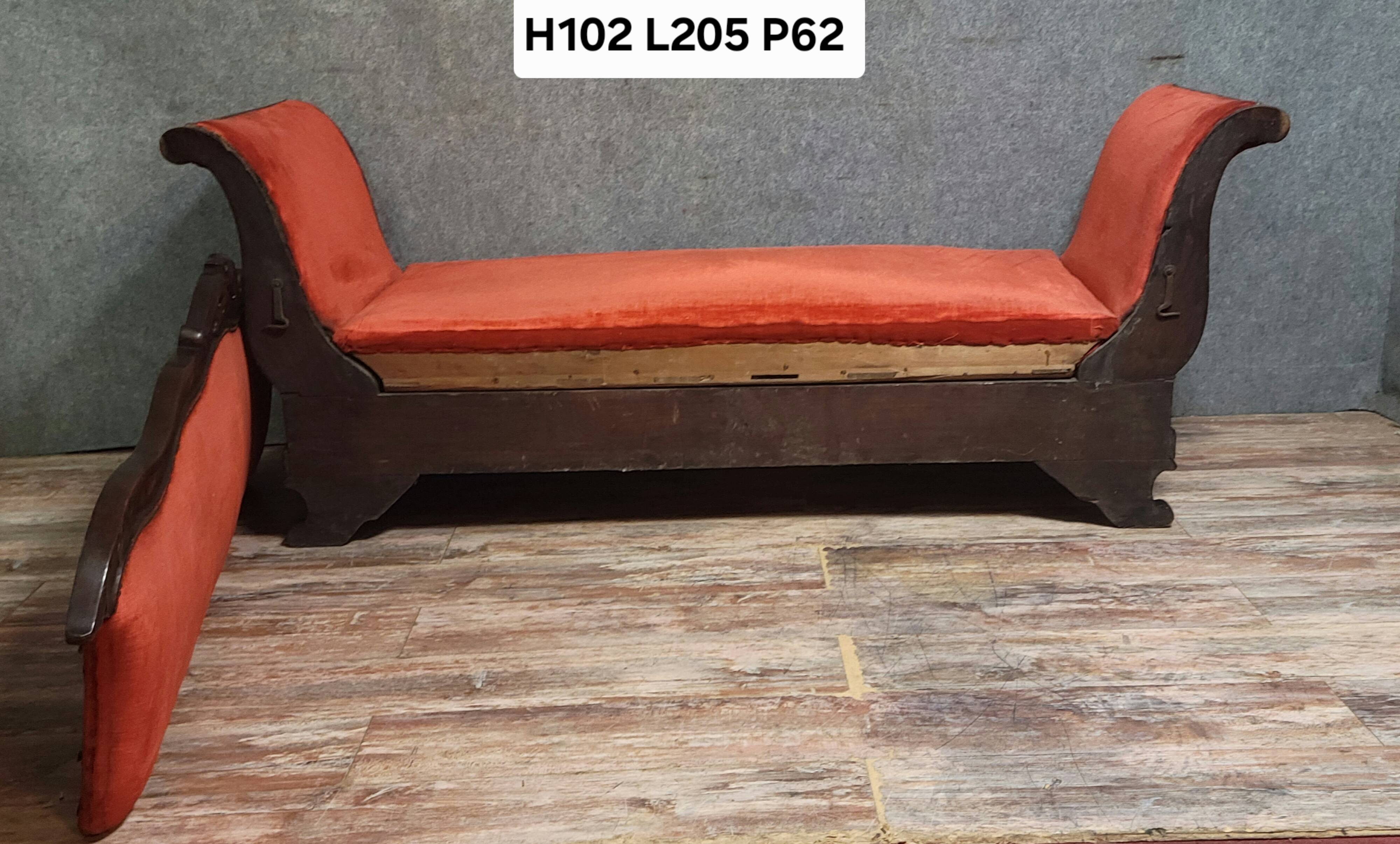 Sleeper or bench from the Charles X period in richly carved mahogany.