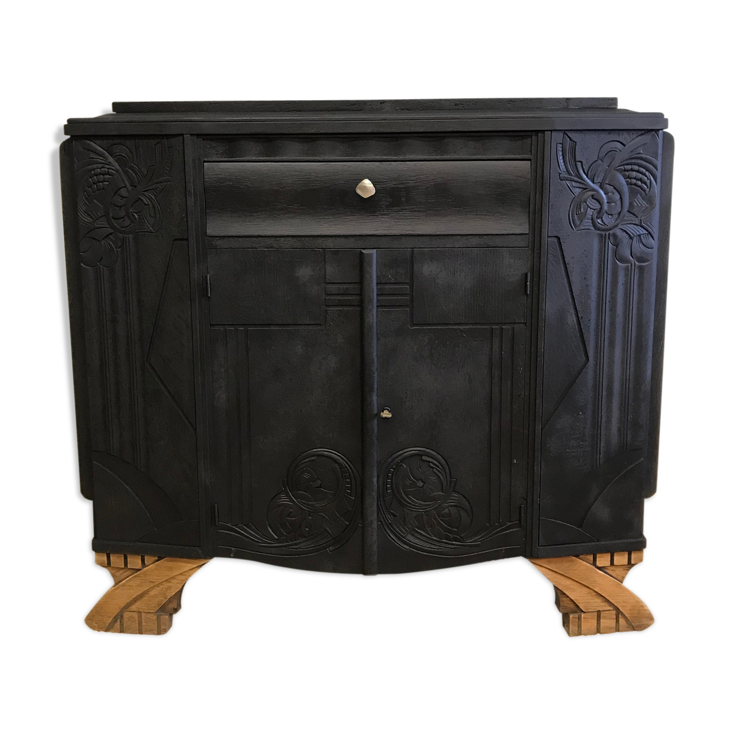 Matte black buffet and raw wood feet