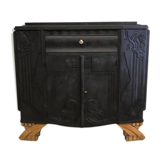 Matte black buffet and raw wood feet