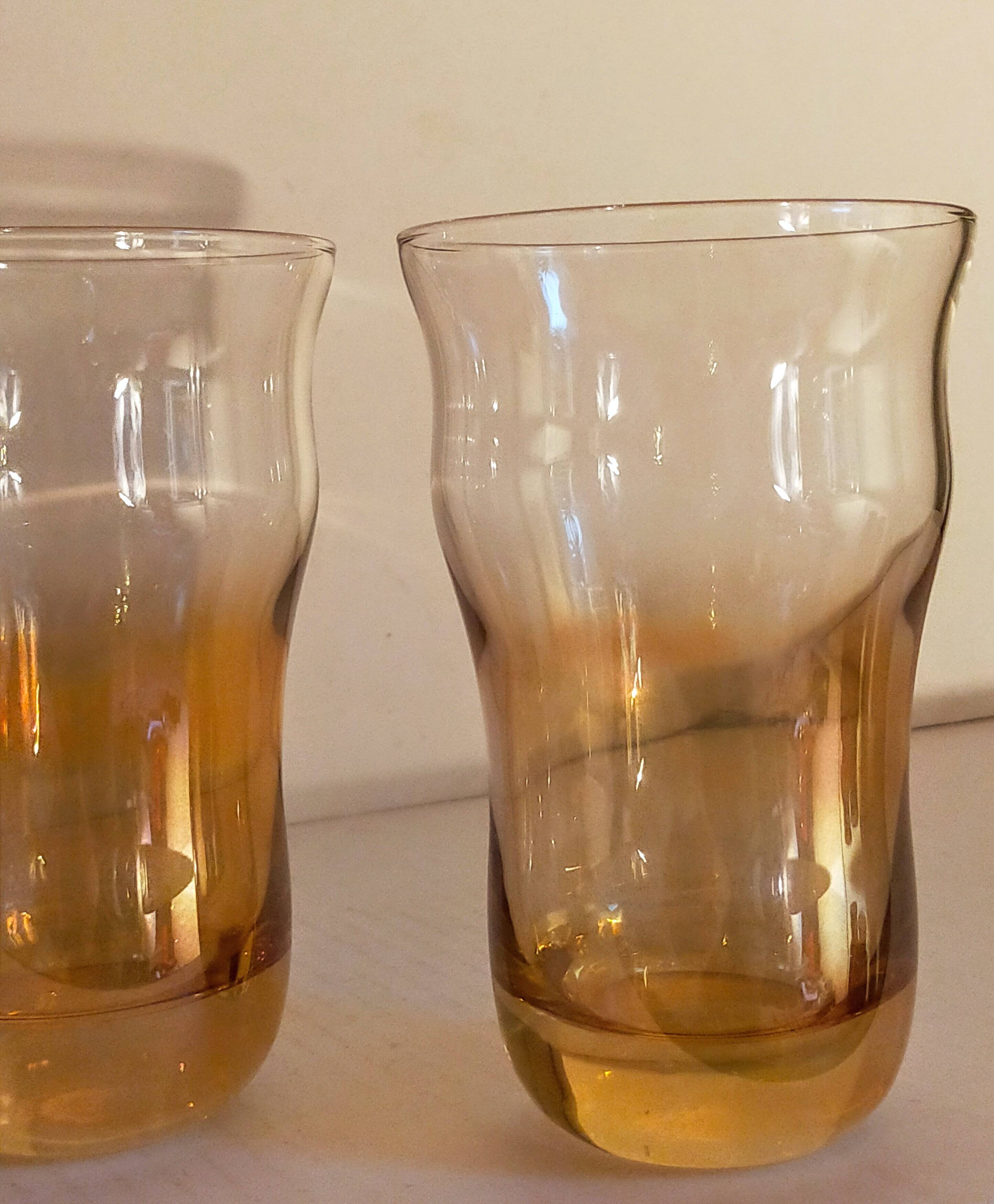 Four iridescent honey blown glass glasses