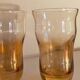 Four iridescent honey blown glass glasses