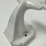 Five art deco white porcelain hooks