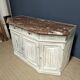 Low patinated sideboard with griotte marble top