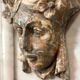 Female mascaron in grey Ardennes marble from the Regency period, 18th century.
