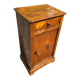 Small rustic antique bedside table made of solid wood.