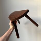 Varnished wooden stool with three legs