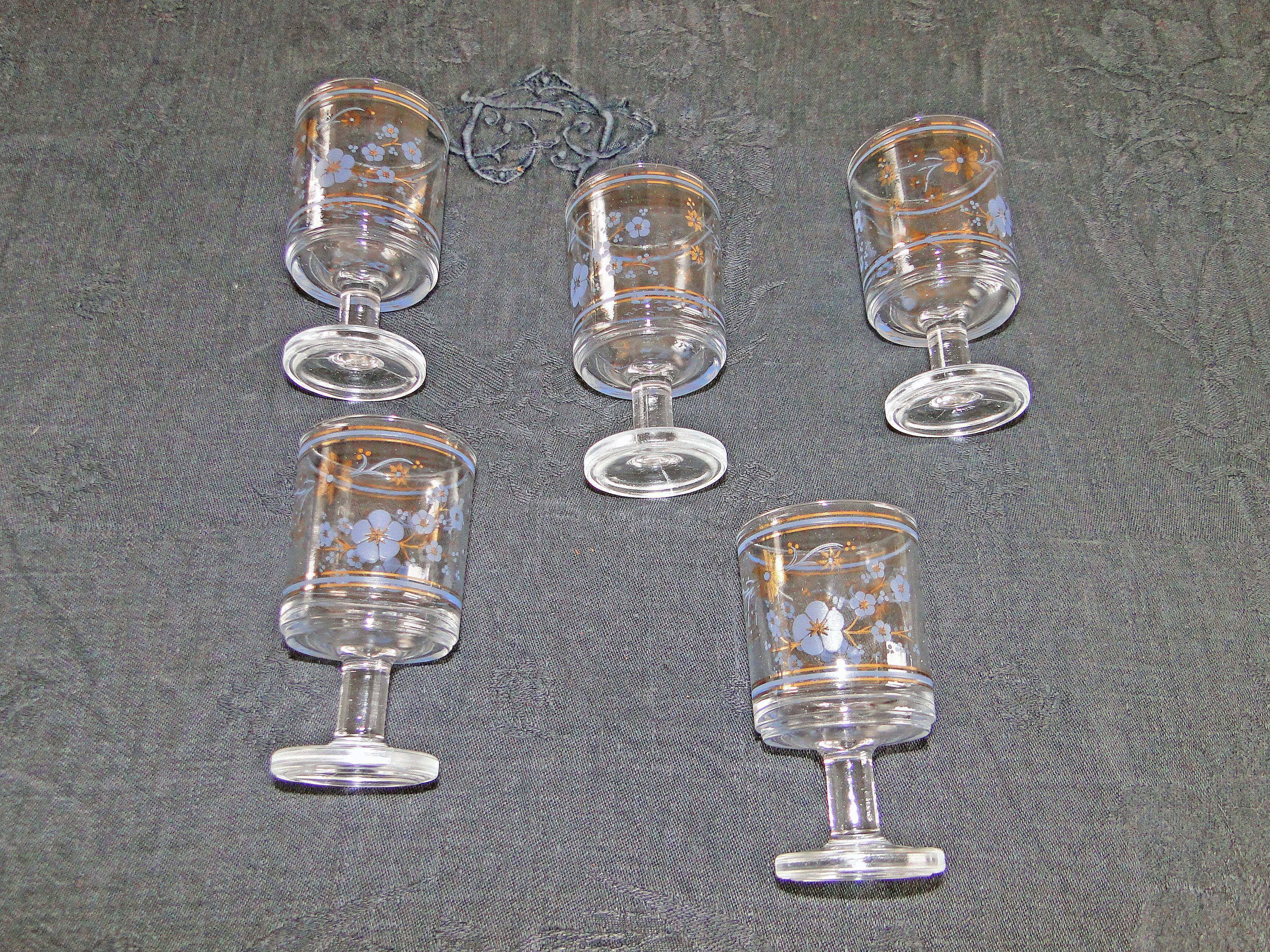 5 old glasses on foot floral decoration blue and gold vintage crystal?