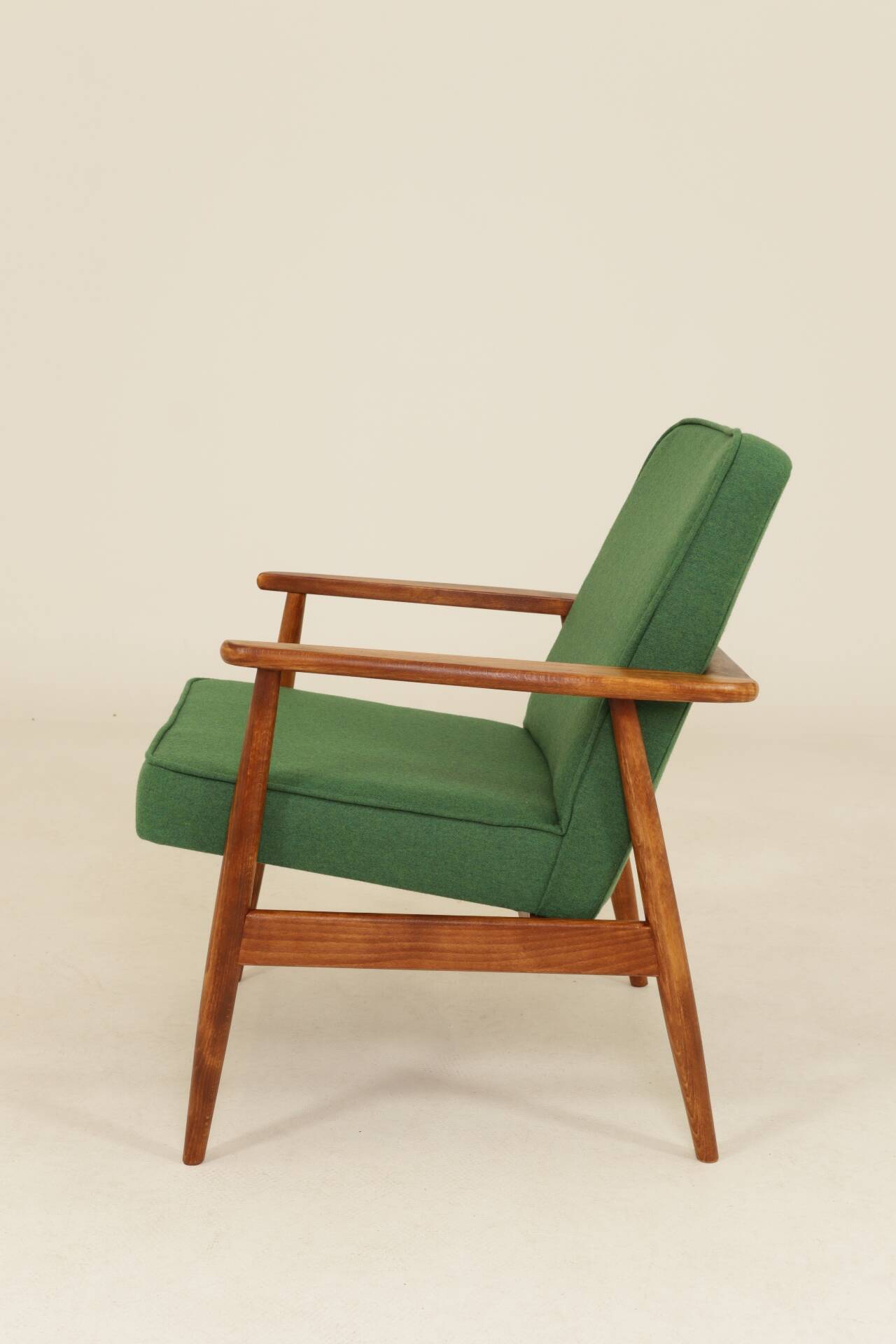 Scandinavian modern chair in green wool, vintage wooden armchair.
