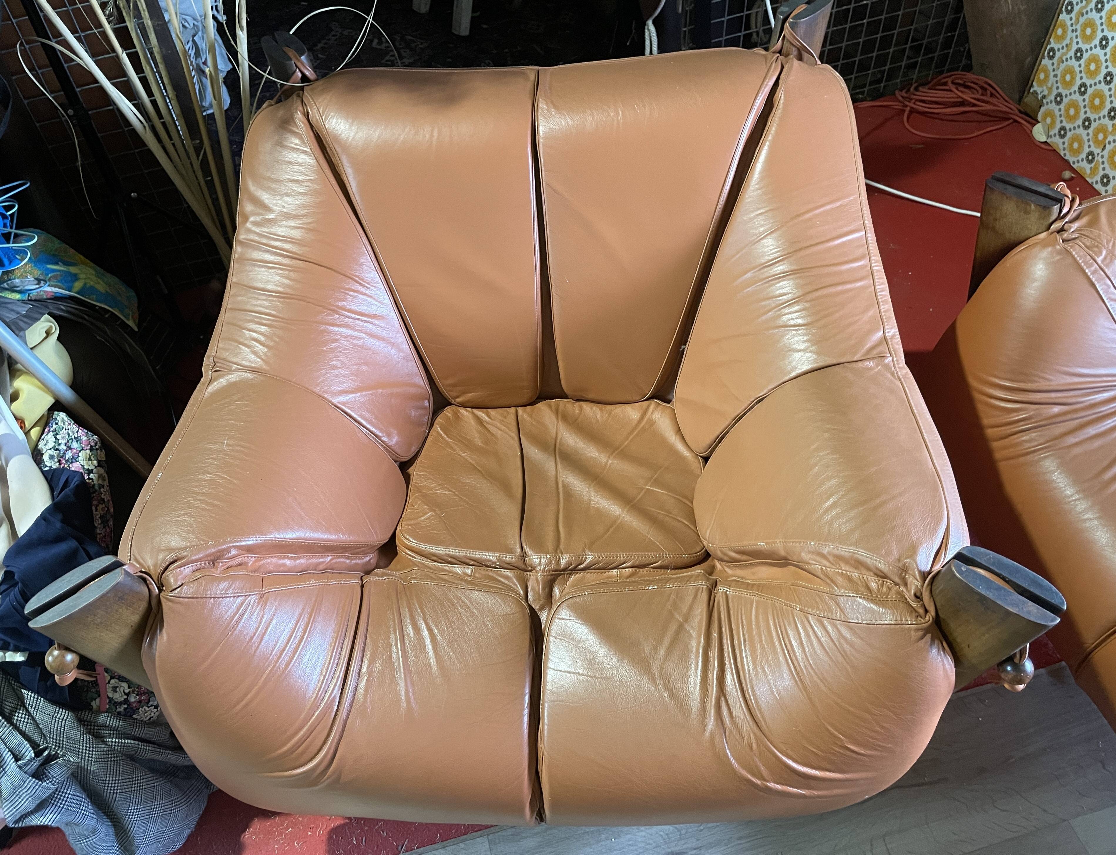 Percival lafer mp-211 sofa set with two armchairs and an ottoman in leather.