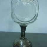 Vase or glass cup on silver stand