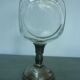 Vase or glass cup on silver stand
