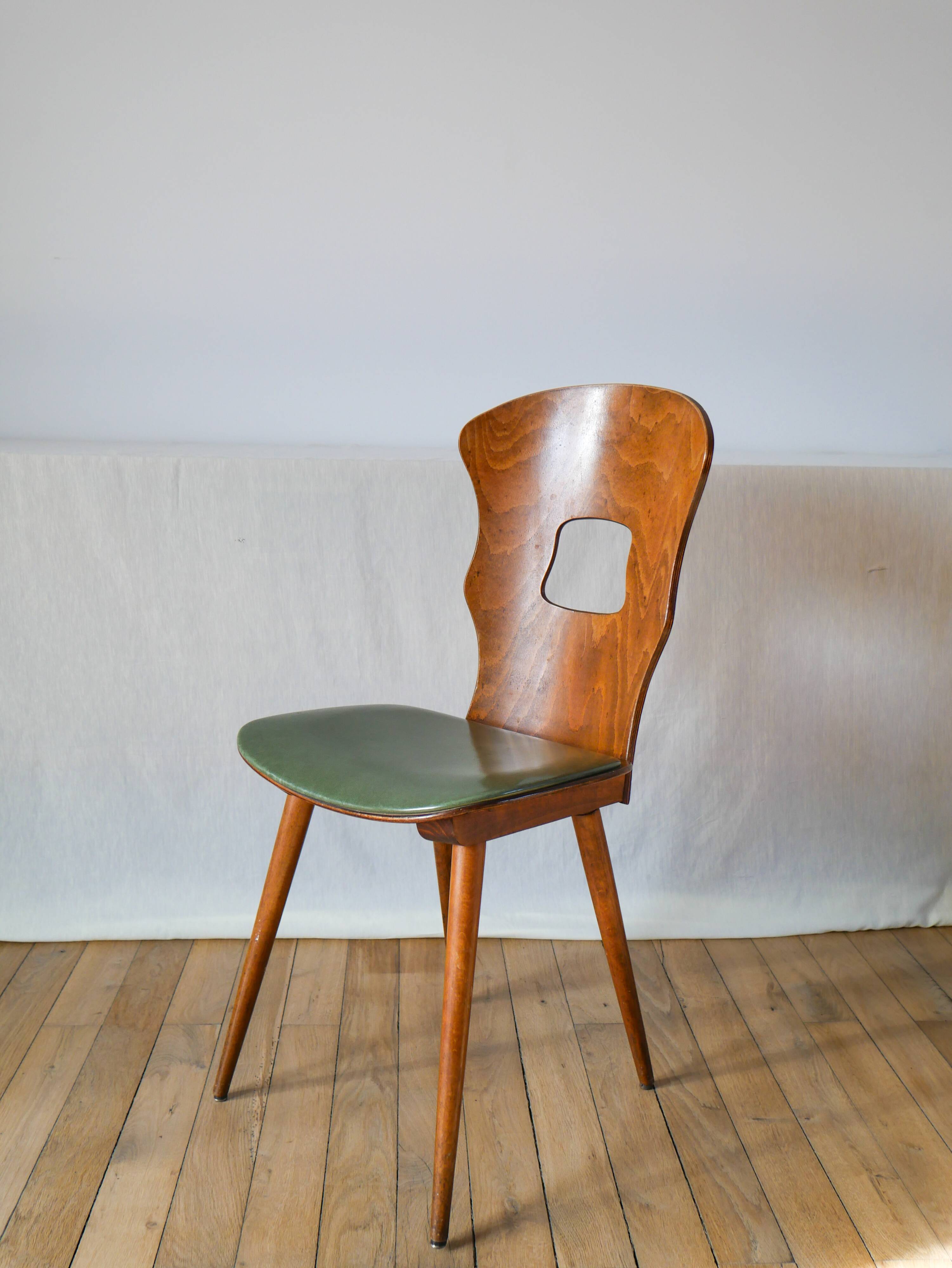 chaise Baumann en bois et skaï modèle Gentiane, 1950