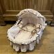 1960s wicker cradle with mattress and drapes.