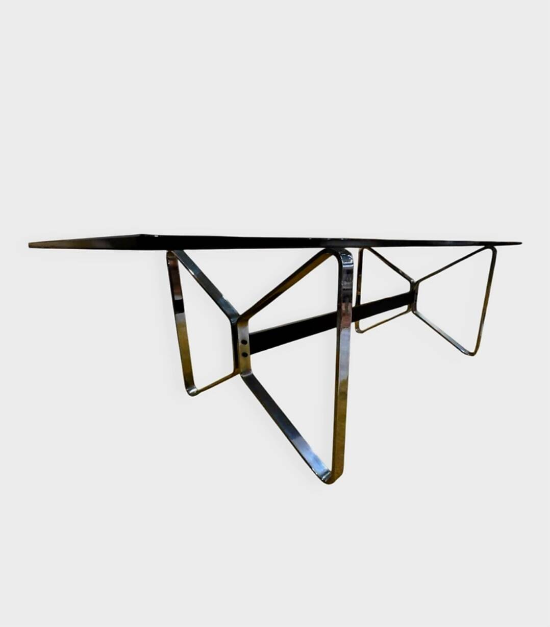 Smoked glass and chrome table design – Italian style from the 1970s.