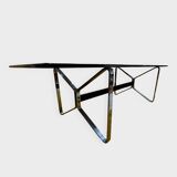 Smoked glass and chrome table design – Italian style from the 1970s.