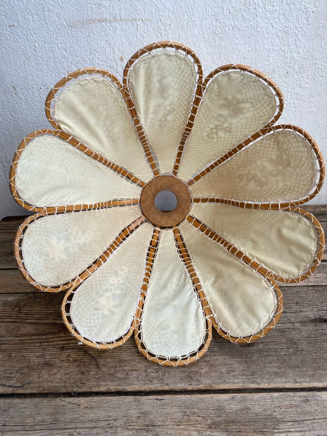 Hanging flower in wood, fabric and hook