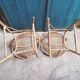 Paire de fauteuils coquille en rotin vintage 1960