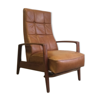 Scandinavian armchair with integrated footrest in leather