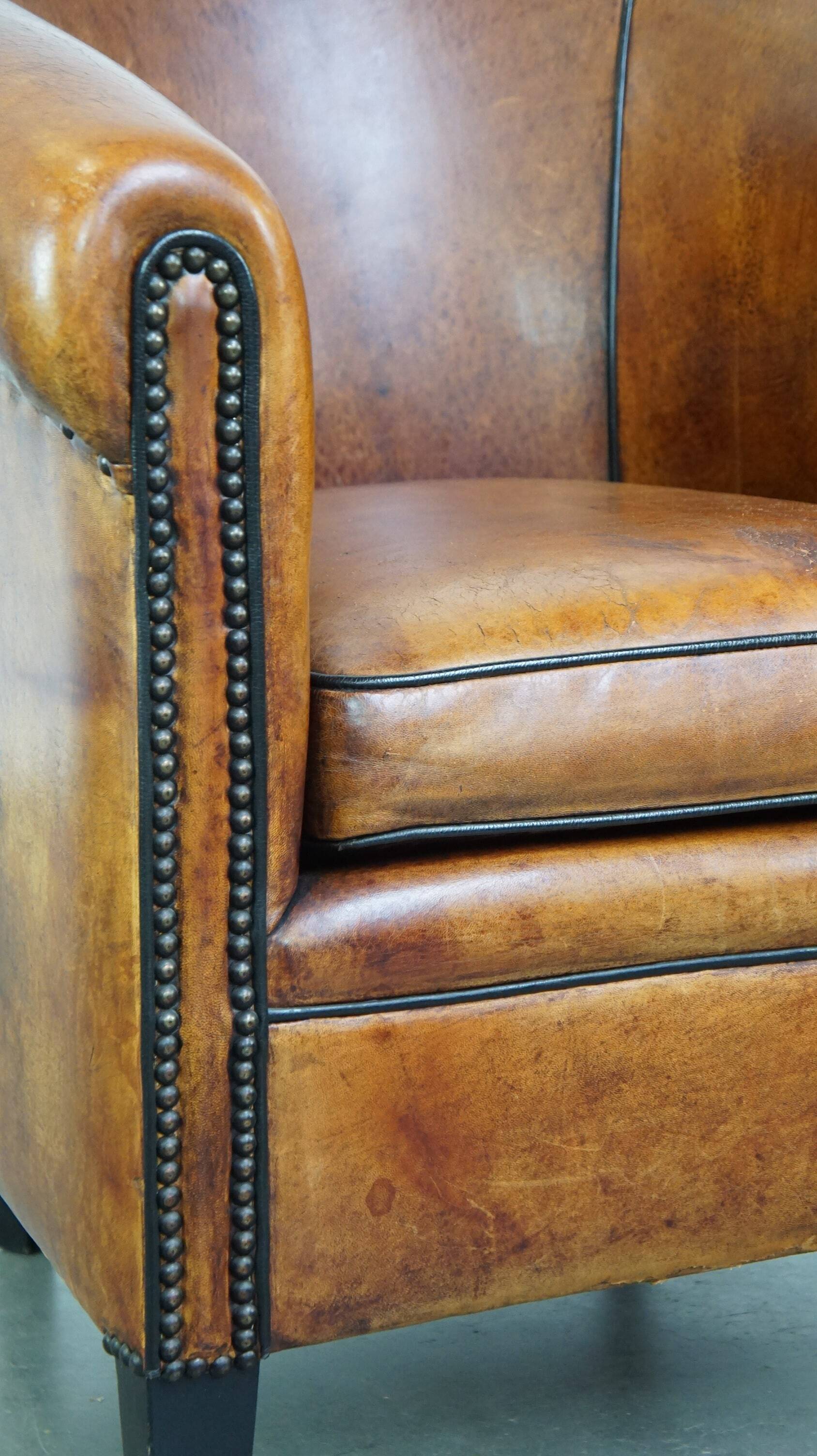 Fauteuil club vintage en cuir de mouton