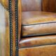 Fauteuil club vintage en cuir de mouton