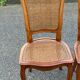 5 solid wood caned chairs, Louis XV style, stamped Baumann