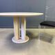 Round French travertine dining table 1970s