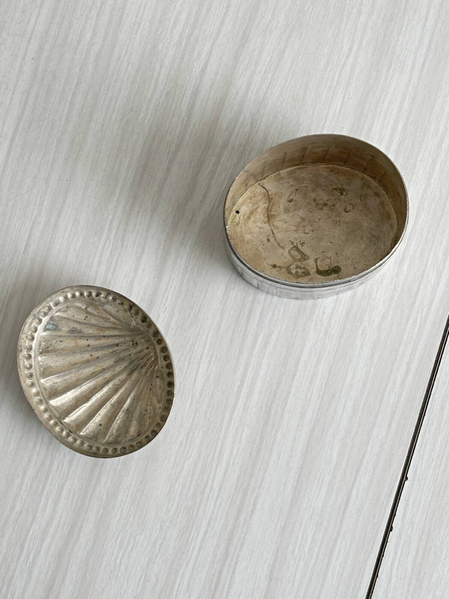 Silver-plated metal catchall with patina