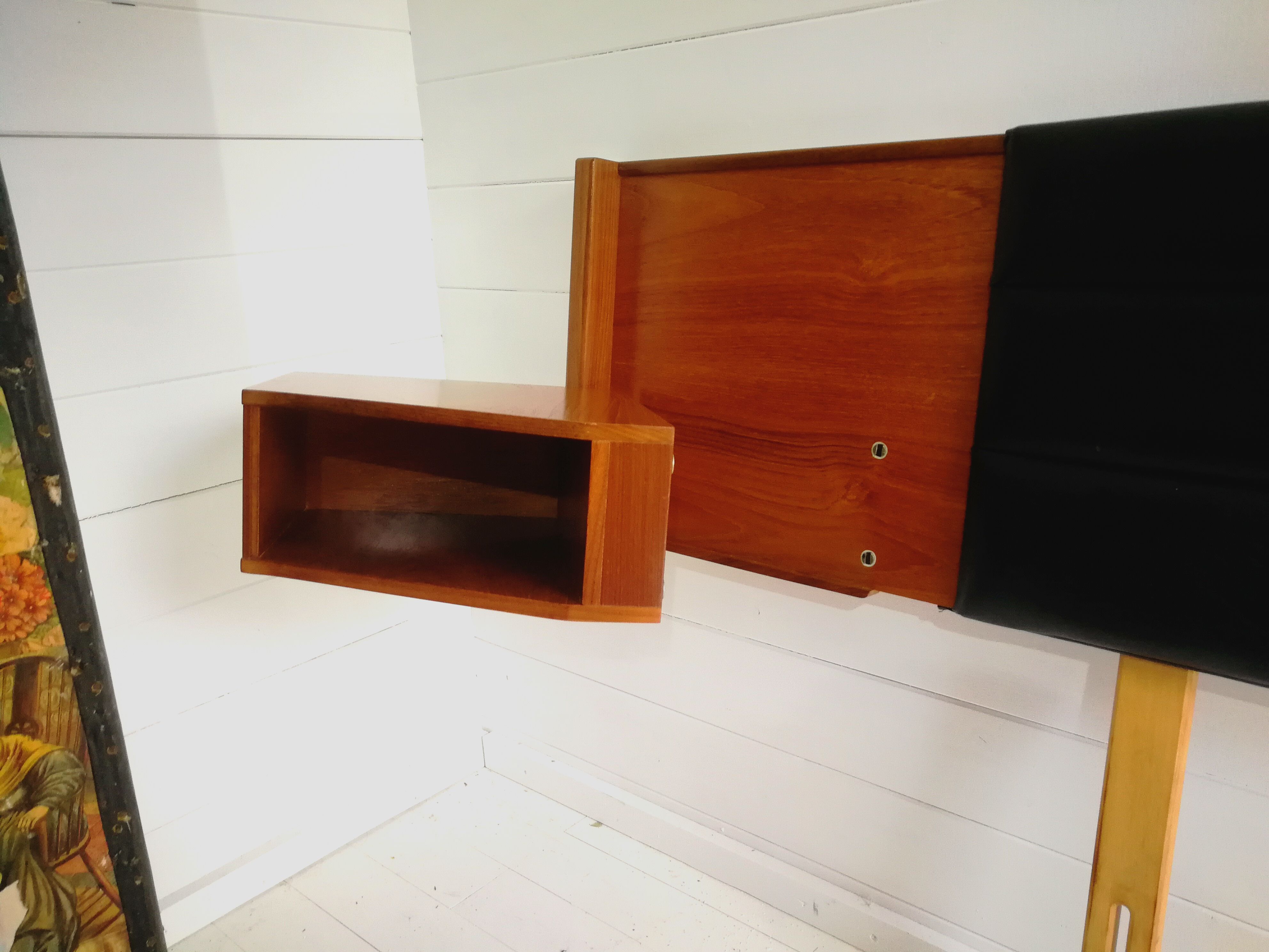 Mid century 1970s retro teak headboard with two hinged bedsides, upholstered in black by 'slumberlan