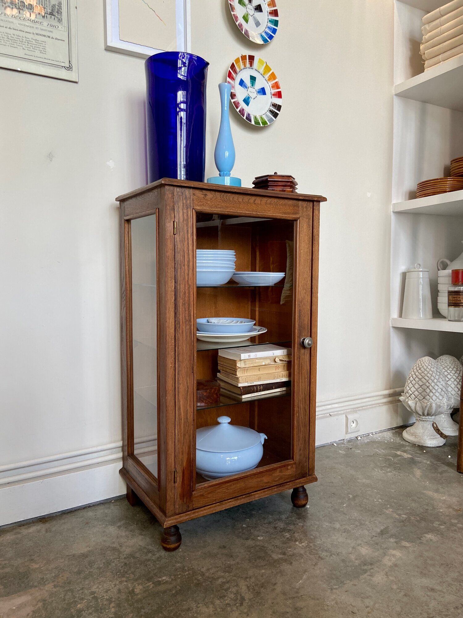 Dark wood display case and transparent glass