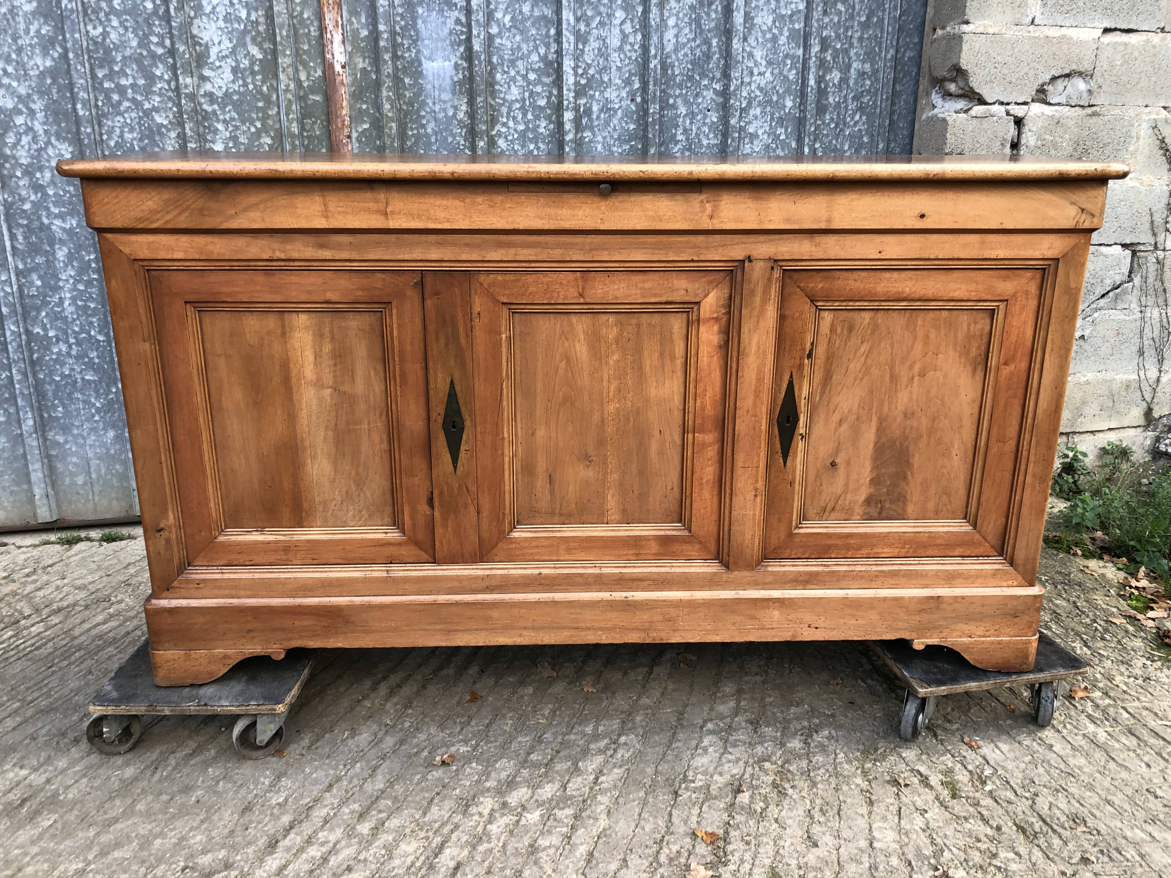 Louis Philippe style sideboard in solid walnut with 3 doors and 1 pull-out shelf.