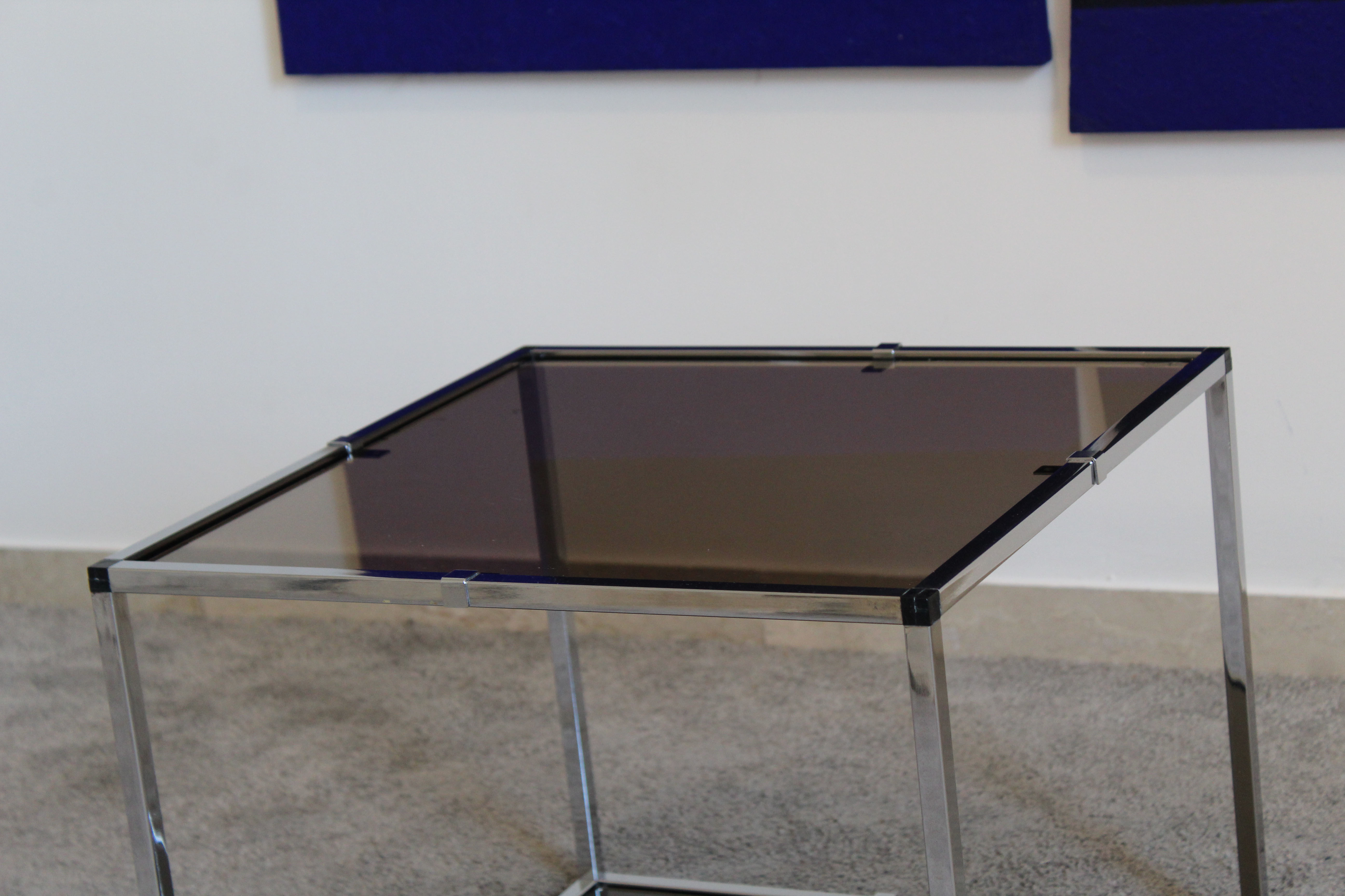 Pair of Coffee Tables in chromed metal and smoked glass, Italy 70's