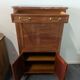 Secretary with a drop-leaf in Louis XVI style made of mahogany and royal red marble.